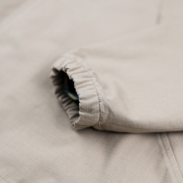 SMOOTHIE POCKET coach jacket – sand ripstop